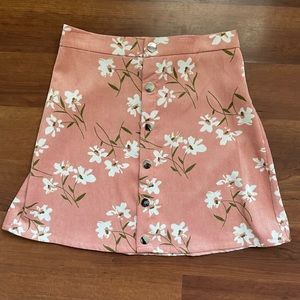 Pink skirt with white flowers, like new, never worn